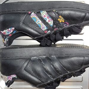 Black Sneakers with Colorful Pattern Accents